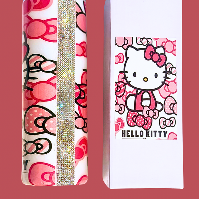 Hello Kitty 20oz stainless steel tumbler featuring a pink Hello Kitty design with bows and hearts, glossy finish with a strip of rhinestones to accent its design, and clear lid with straw included.